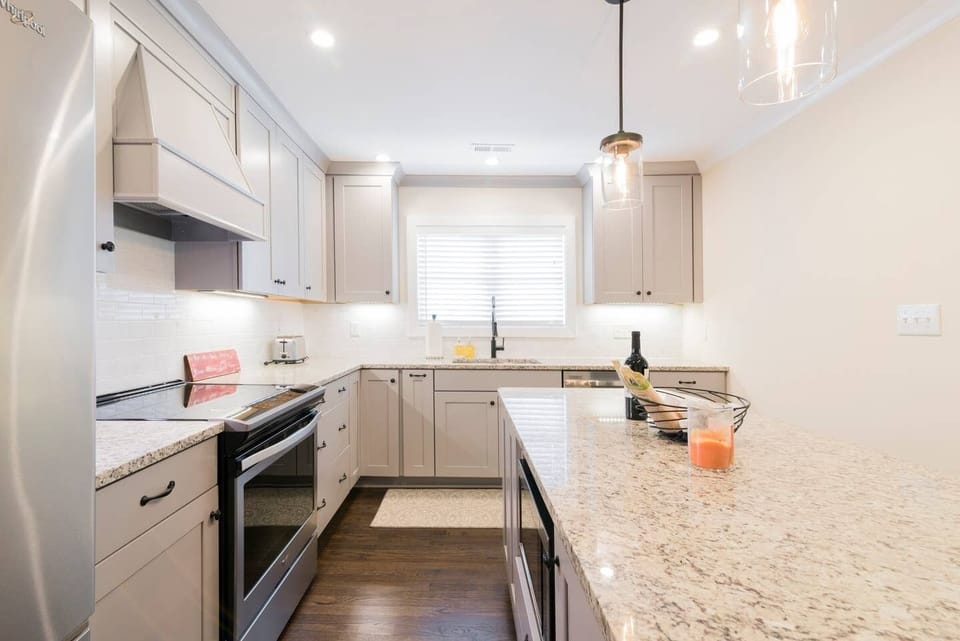 Custom Kitchen w/ Granite and Top Of Line Appliances