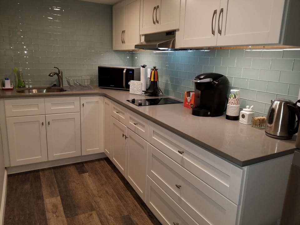 Kitchen with microvawe, coffee maker, kettle are some of the amenities.