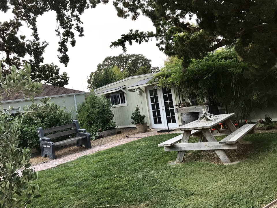 Barn/winery with picnic area and vegetable garden