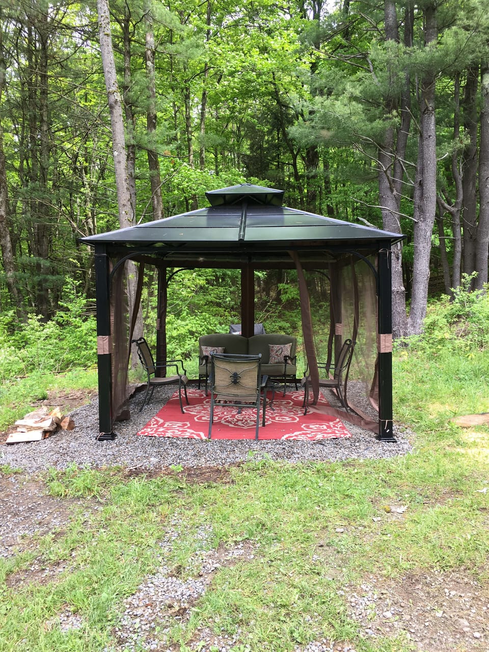 Private gazebo with BBQ grill and fire pit. 