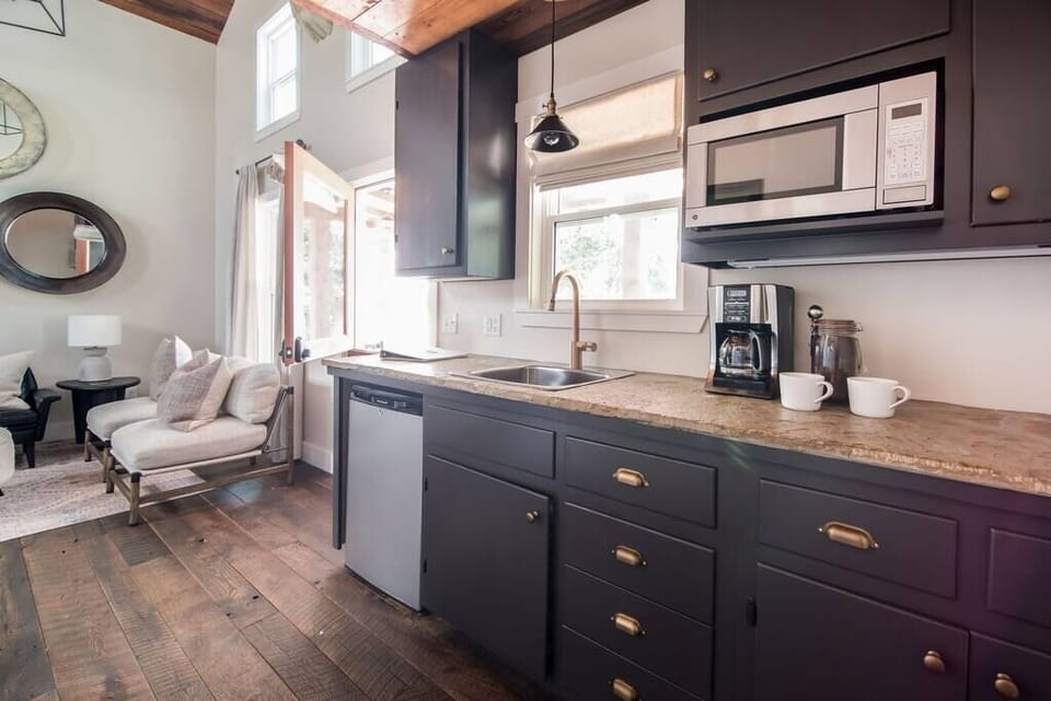 Kitchenette with microwave, mini-fridge, and essentials