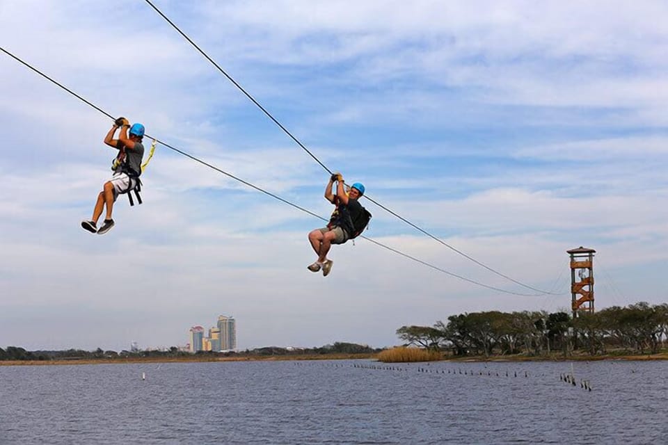 Zipping Over Gulf State Park Lake Shelby in Gulf Shores.