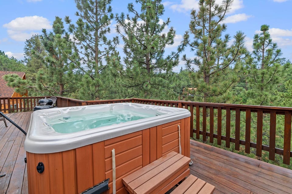 Back Deck - Private deck with treetop views, seating area and private hot tub
