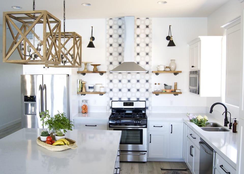 kitchen white modern with large squarenn island and ample counter space