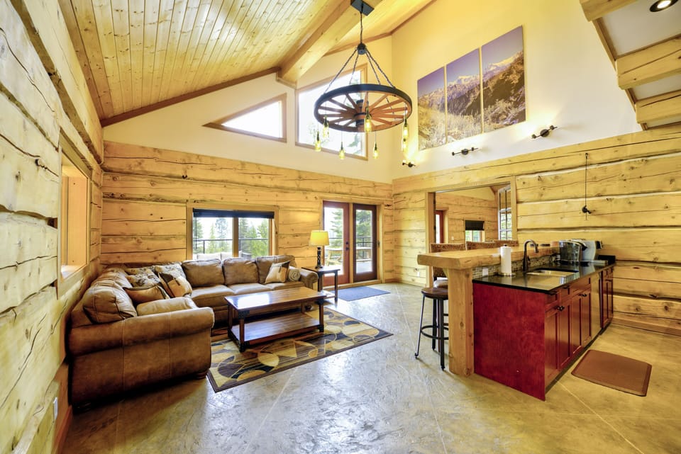 On the other side of the kitchen is a large sit-up bar with seating area...