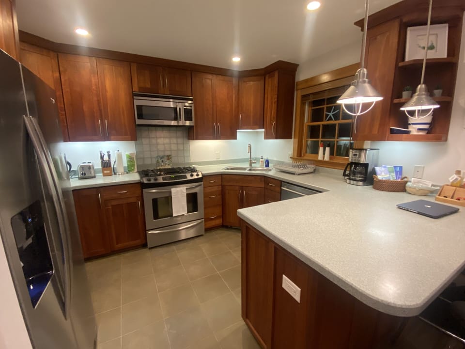 Custom gourmet kitchen with cherry wood cabinets, and everything you need!!