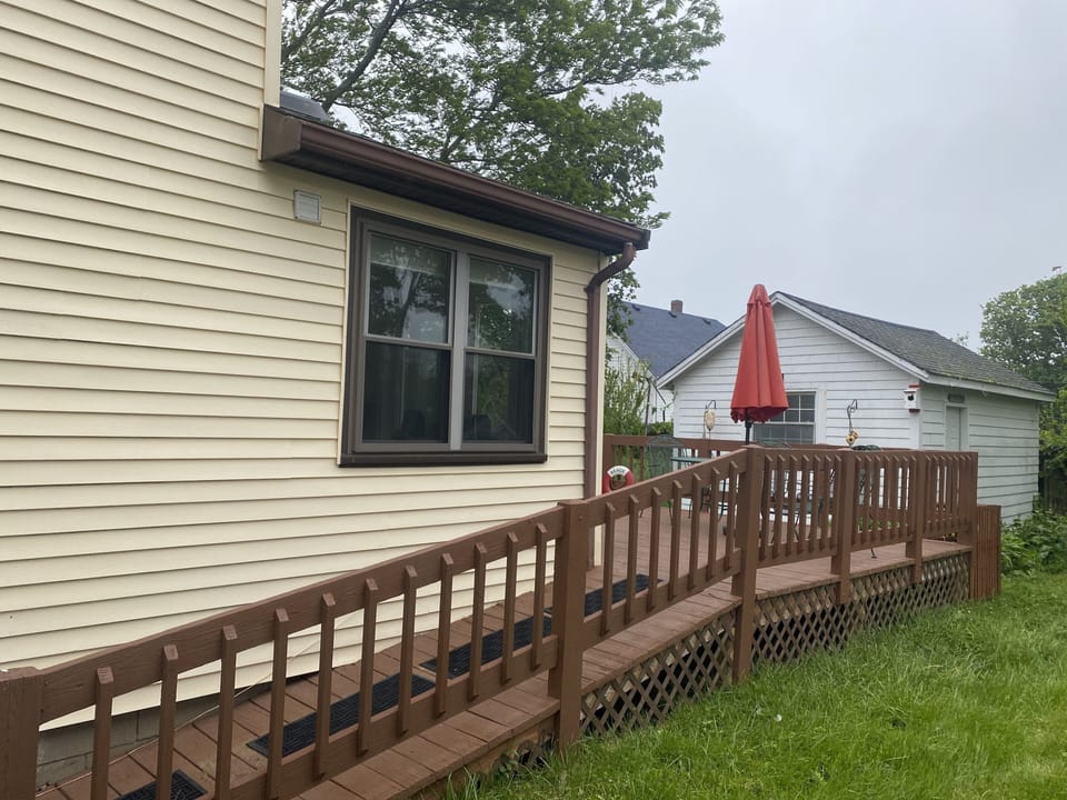 Easy ramp access to spacious back deck and the house. 