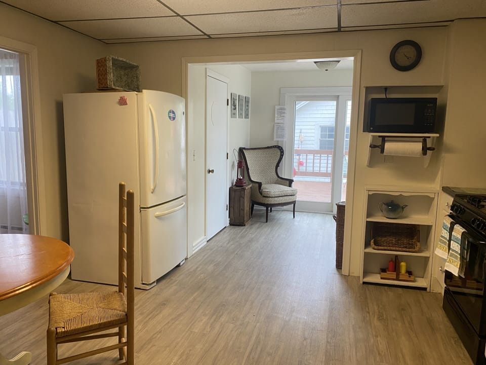Kitchen with coffee maker(Keurig and drip). Adjacent dinning room,laundry room. 