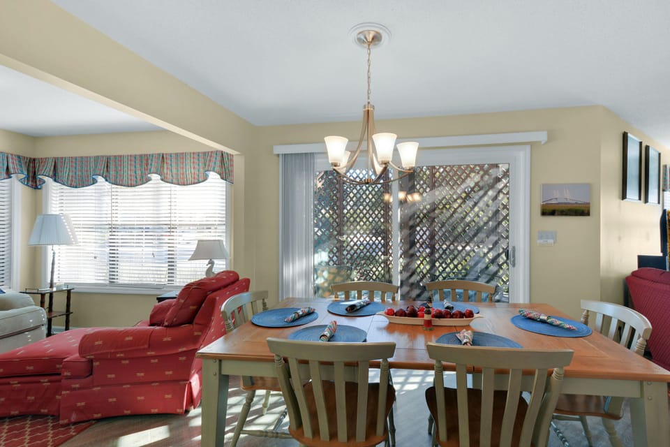 Dining Room Doors to the Patio - This angle shows how the dining area opens directly to the outdoor seating space.