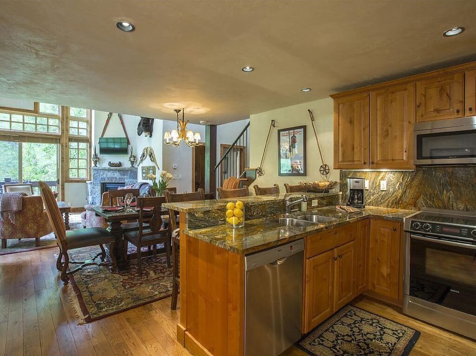 kitchen, dining and living areas