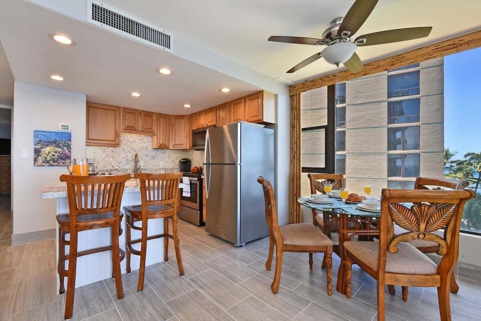 Dining table adjacent to the kitchen for easy serving