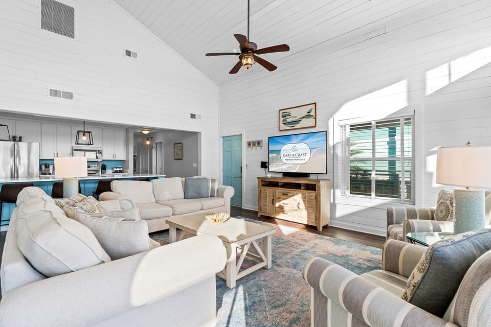 Relax in this bright living space where coastal charm meets comfort—your perfect spot to unwind after beach days.