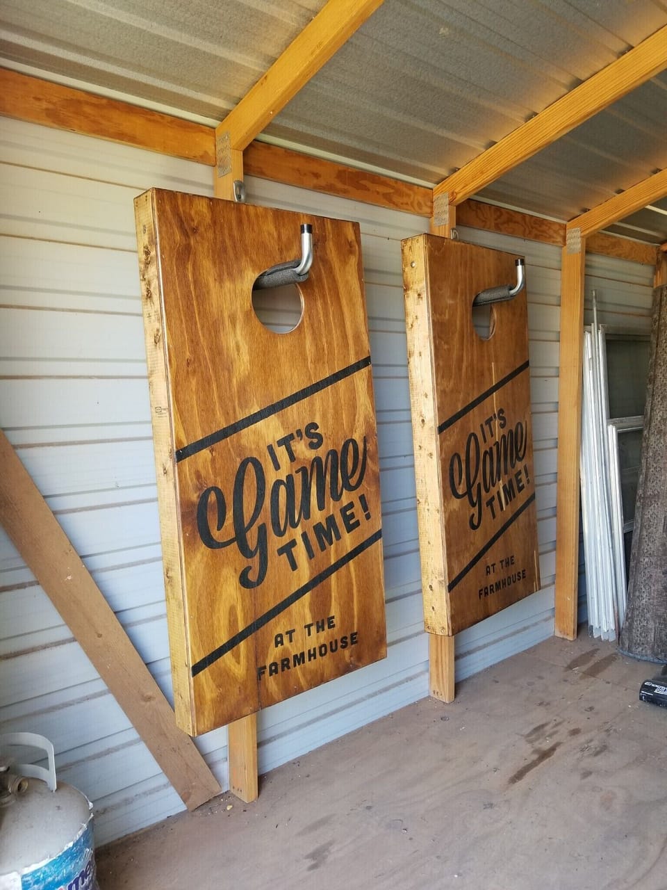 Cornhole boards located in outdoor shed!