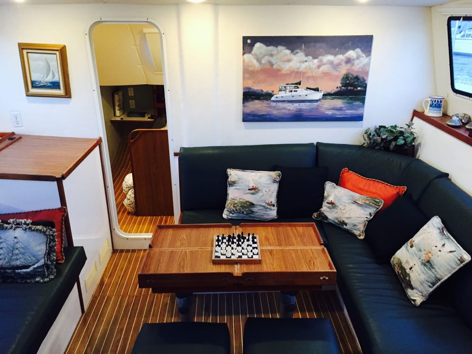 Below the deck has ample seating for inside dining and playing games.