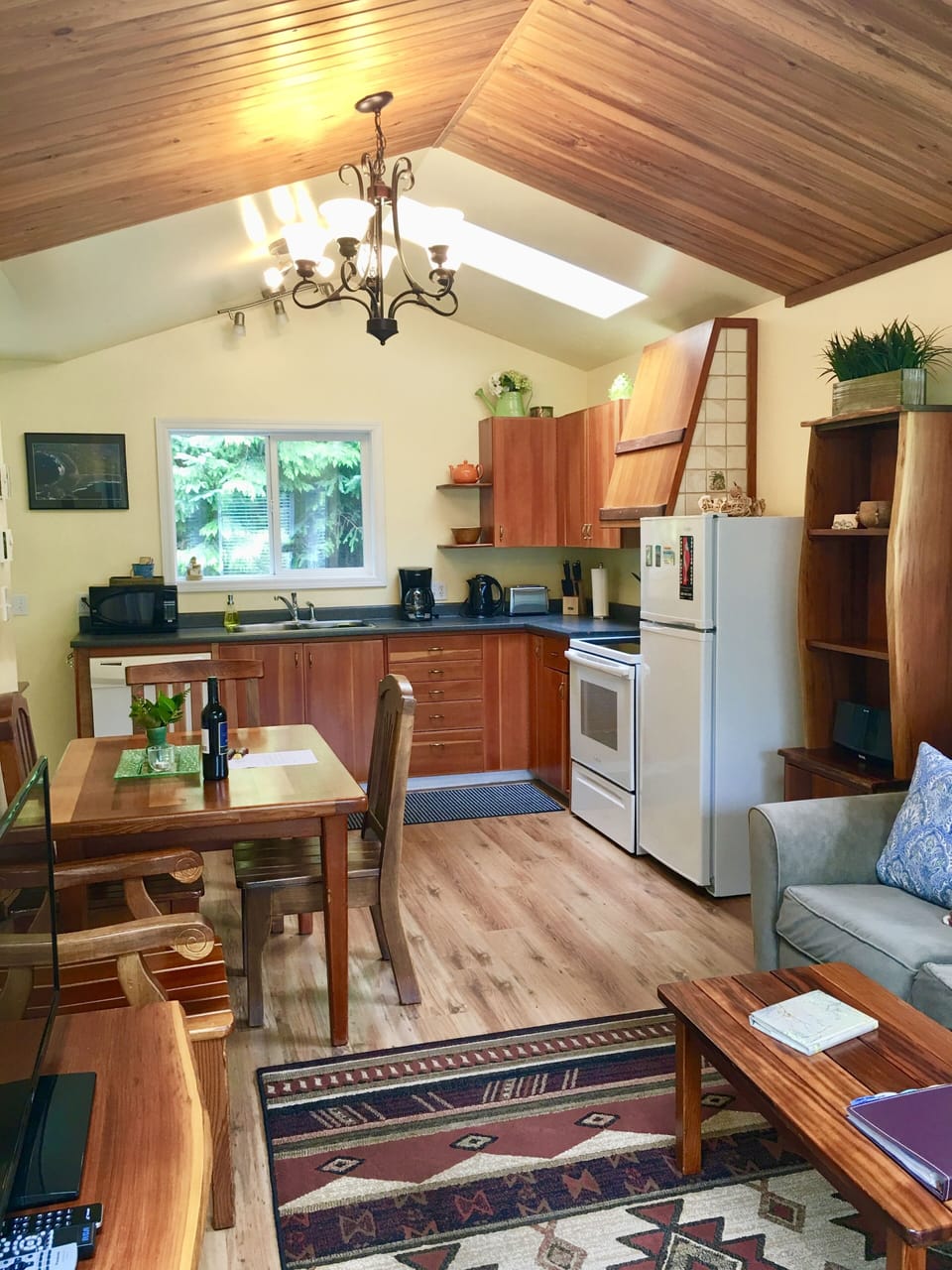 Full kitchen with all appliances, open living and dining. 