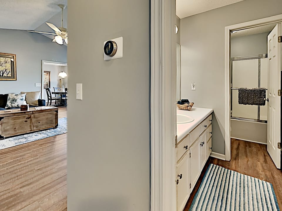 hall full bath has separate toilet and shower area