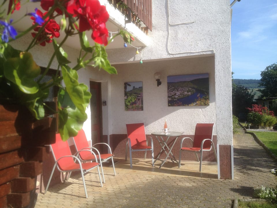 Front door of holiday flat and patio