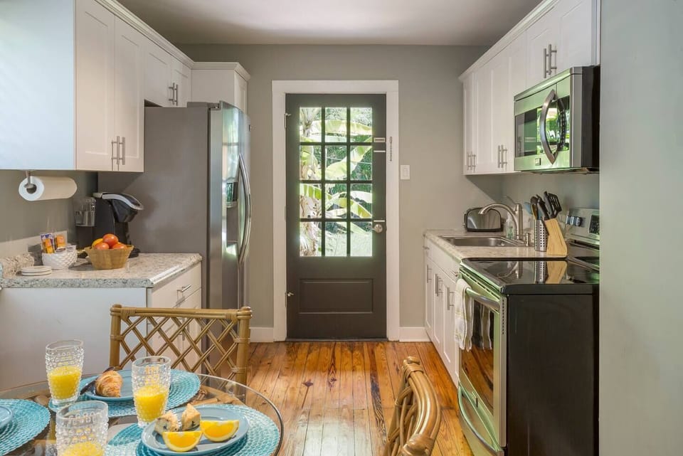 Kitchen: Bright and airy space perfect for culinary adventures and morning coffee bliss!