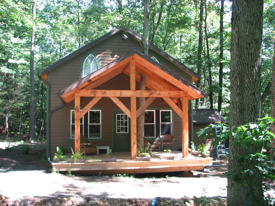 Timeframe constructed porch is for relaxing and swapping stories of the day.
