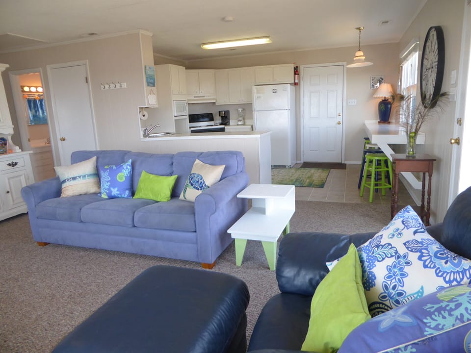 There are three flat screen TVs in the cottage. Perfect bright room for relaxing