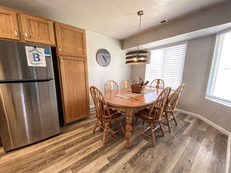 Inviting dining nook with table seating and warm lighting