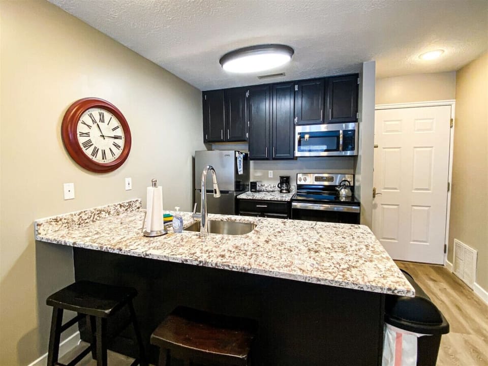 ge 9  Functional kitchen with stainless appliances and ample counter space