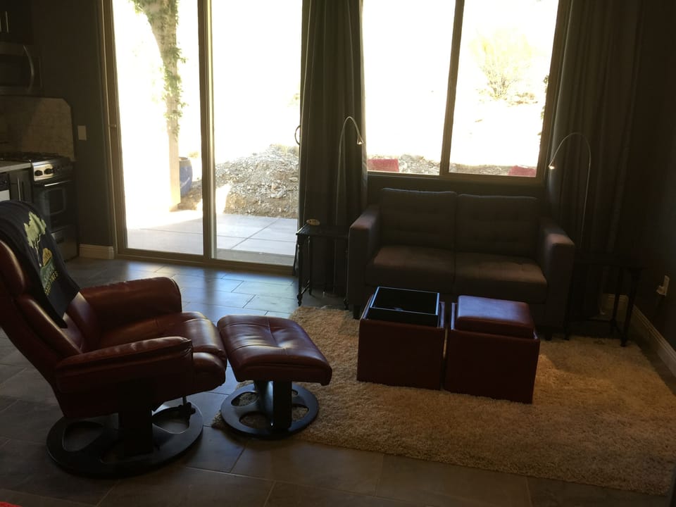 Living space that looks out at the Catalina Mountains.