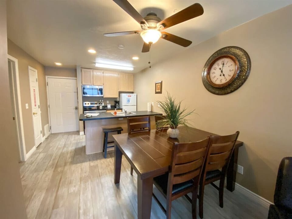 Welcoming dining area with warm lighting and spacious seating, perfect for enjoying shared meals together