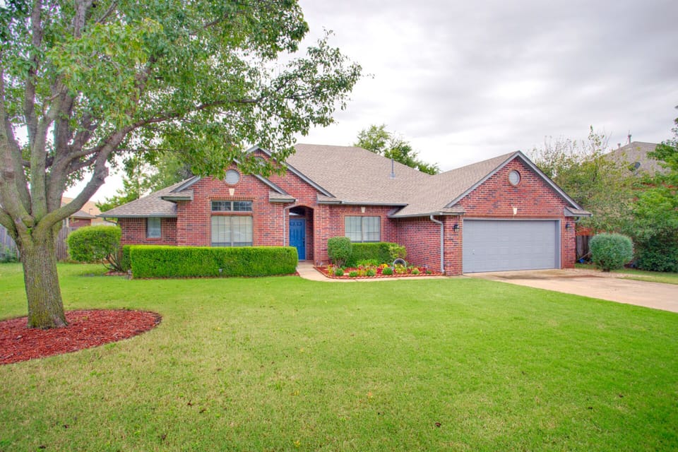 Beautiful brick home with 2 car garage and storm shelter