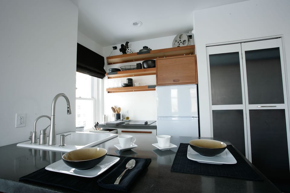 This little kitchen is packed with all you need except for an oven. 