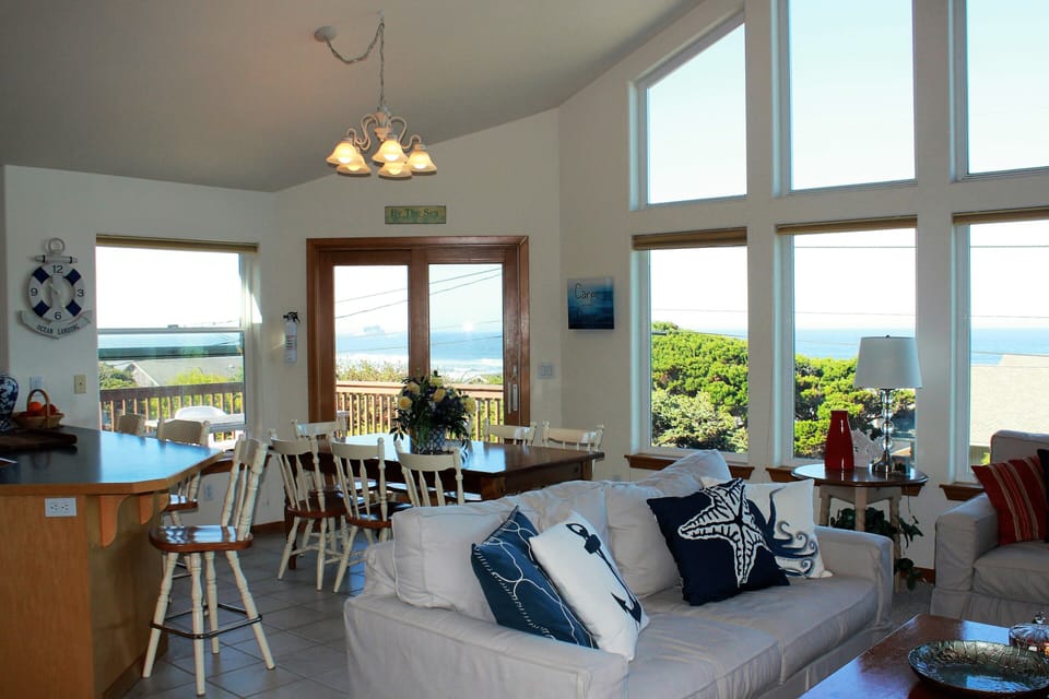 Dining room and deck overlooking beach