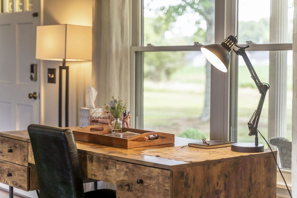 Dedicated workspace with idlyllic farm views.