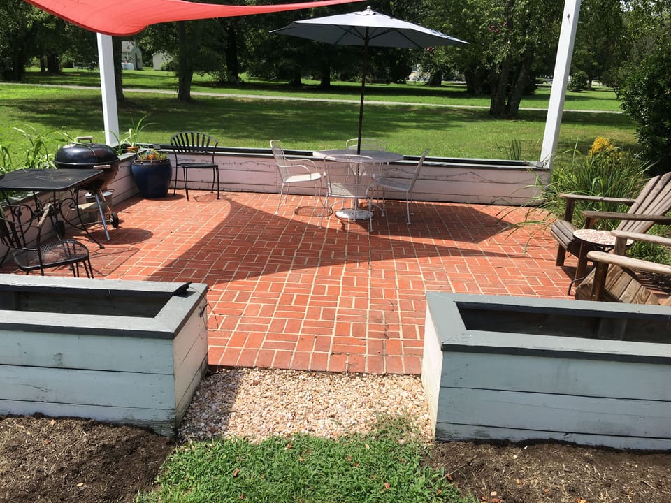 The back patio is a great spot for early morning coffee or an afternoon cookout.