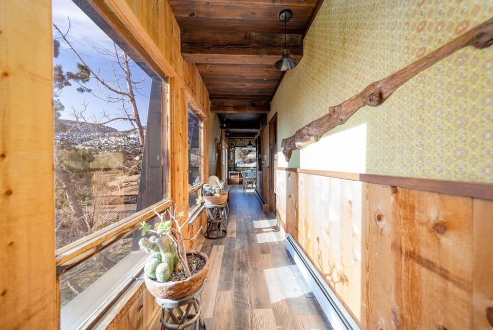 Hallway leading to kitchen.  Laundry on right