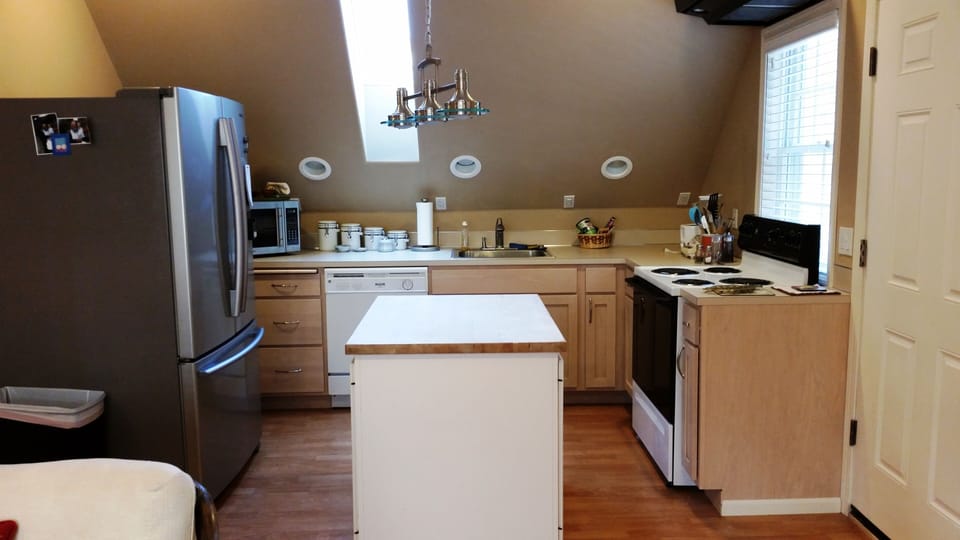 Fully stocked kitchen - open floor plan kitchen, living room and breakfast nook