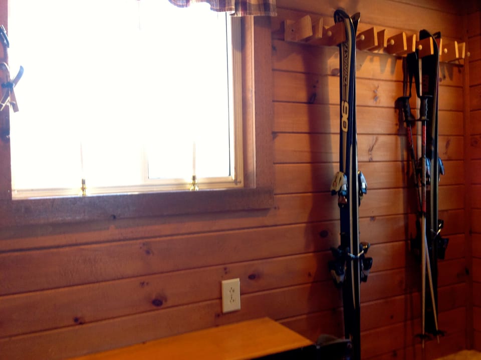 A place to hang your skis and take off your shoes.
