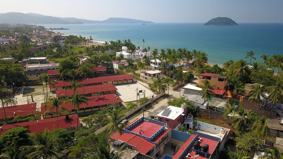 aerial view above house looking to the bay
