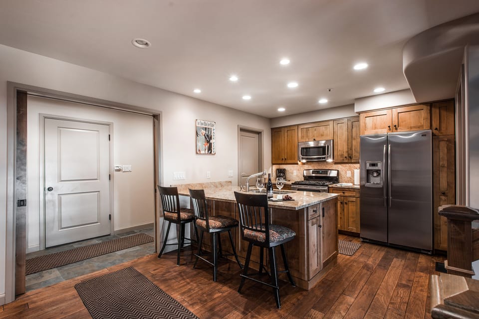 Kitchen area with mudroom and door leading to garag
