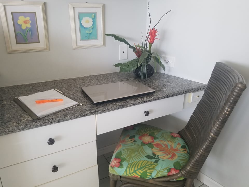 Office Corner, File Cabinet & Drawers to keep Business out of Way until Needed.