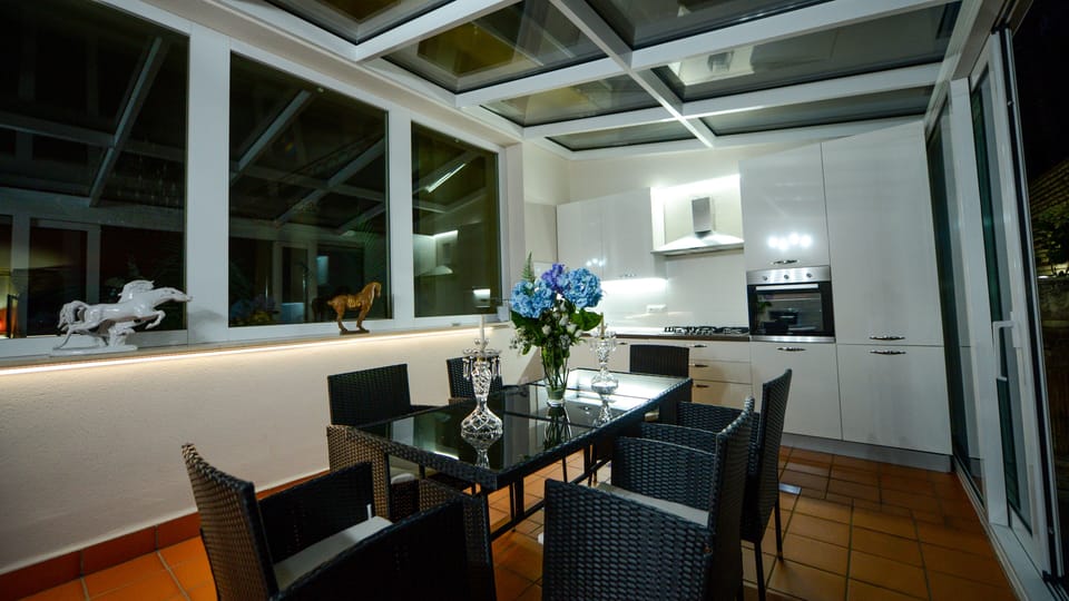 Kitchen with Ceiling Glass by Night
