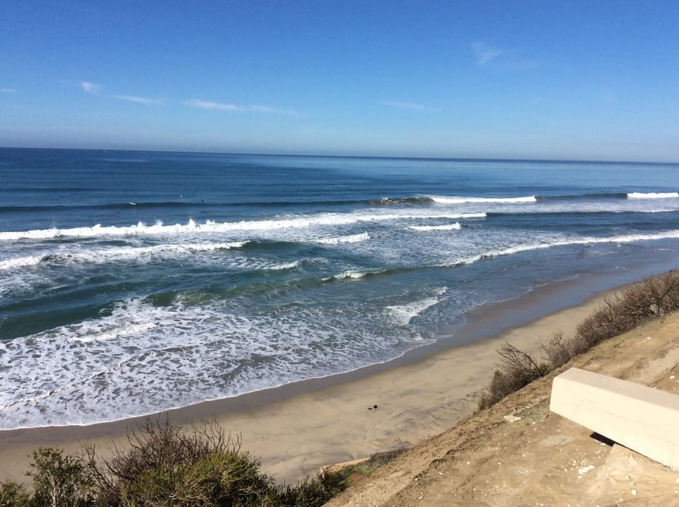 Views from railing 15 ft past our patio looking down to the beach