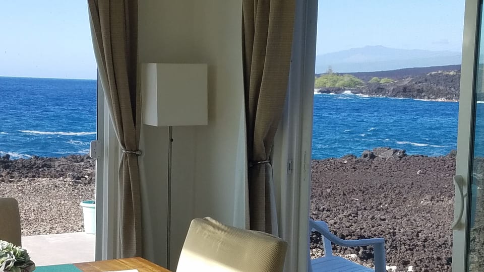 Our dining table. Notice Volcano that overlooks Kona in the background?