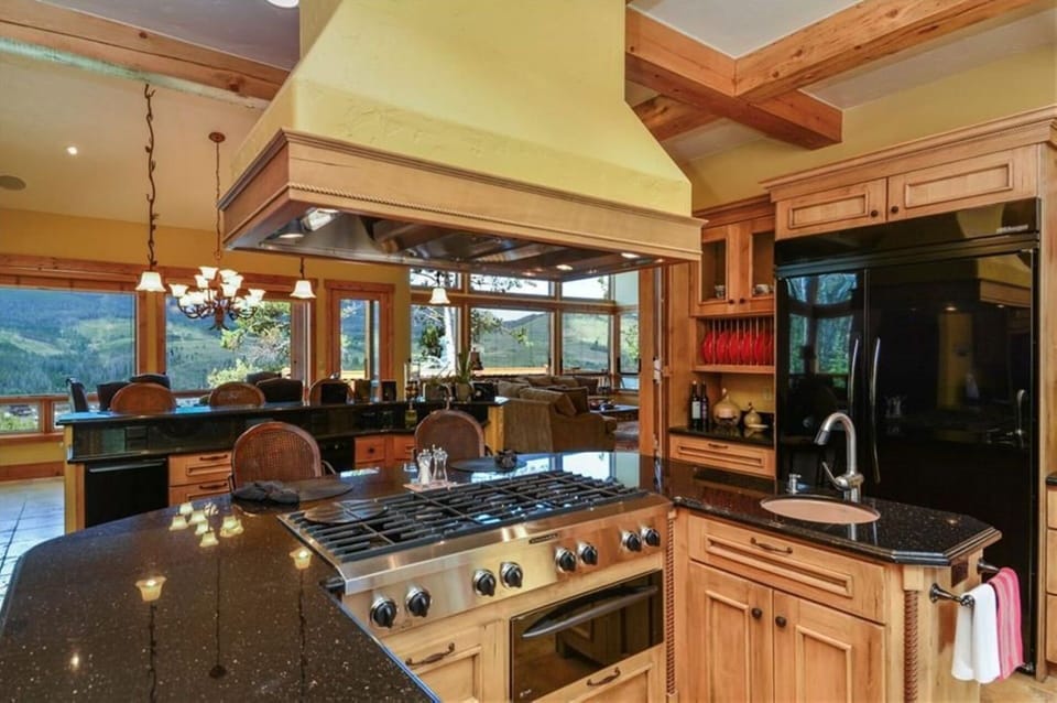 Gourmet kitchen with 8 burner gas stove and warming oven, plenty of room to cook