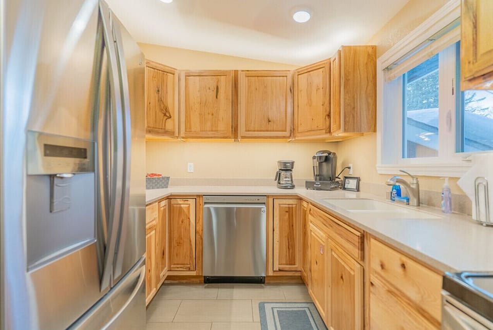 Full Kitchen with Stainless Steel Refrigerator and Dishwasher