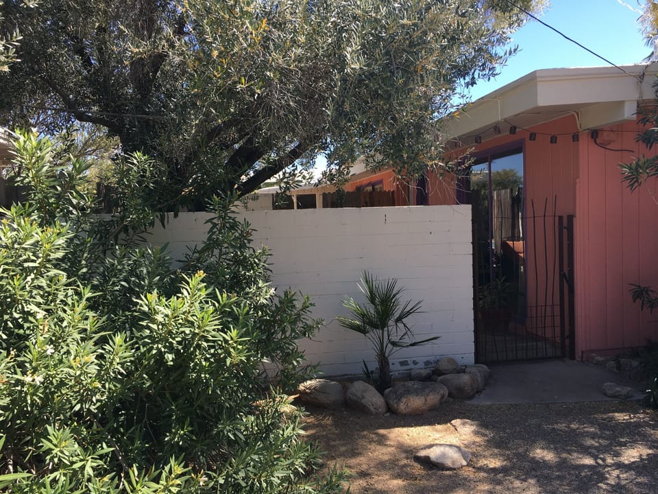 entrance, plenty of off street parking.  Grill available and bike storage.