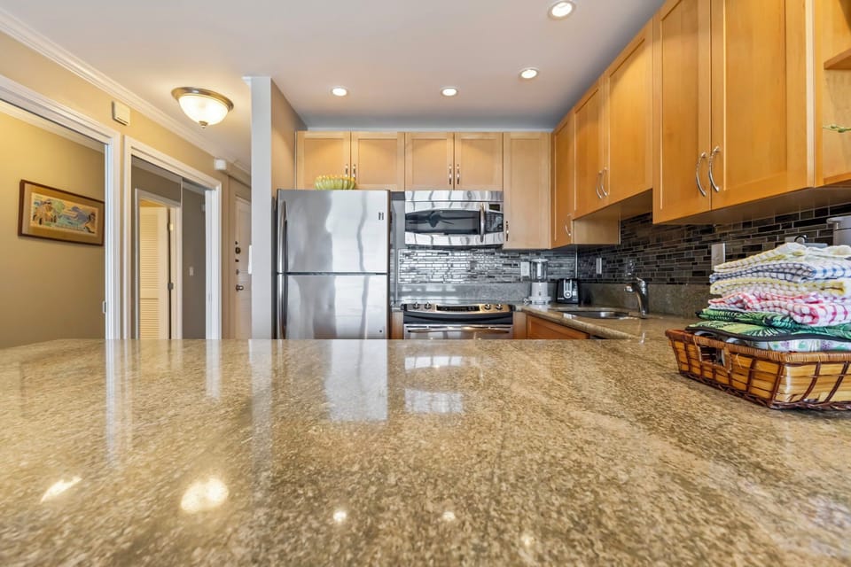 Kitchen - Large island for food prep. We supply dawn dishsoap and paper towels.