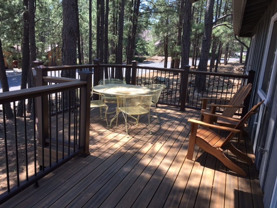 Front porch with new Trex deck; 48" table seats 6 comfortably.