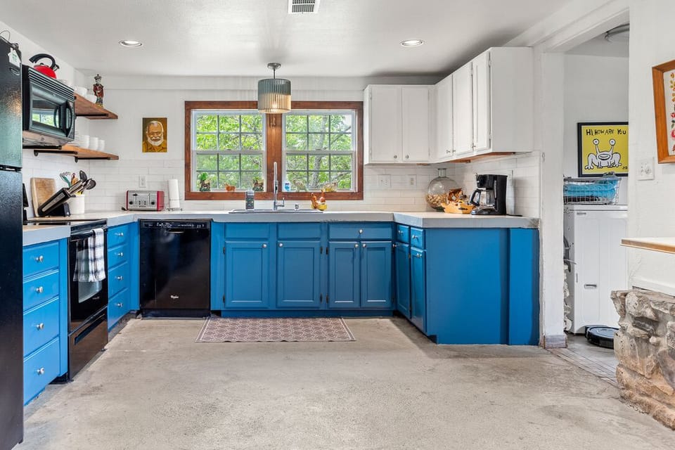 Kitchen with coffee maker and coffee.