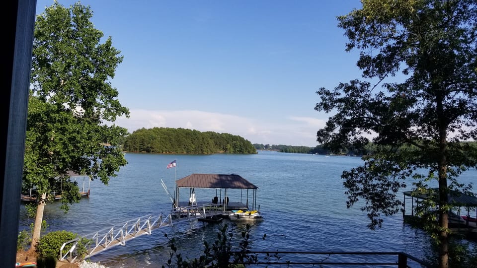 Oversized covered boat dock provides gorgeous views and plenty of shade
