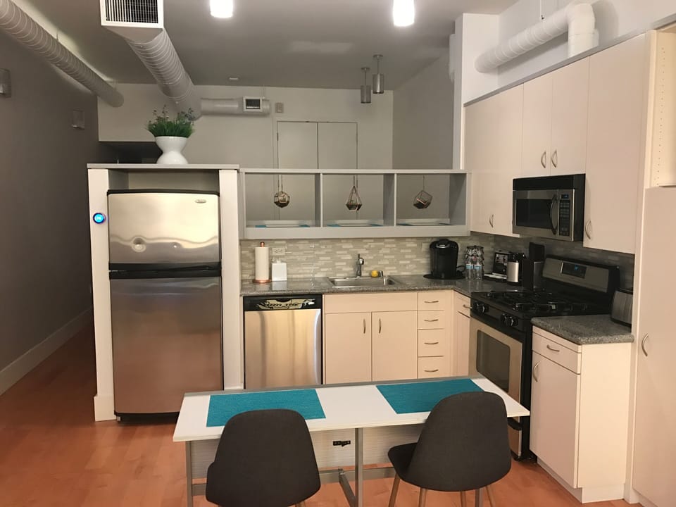 Kitchen.  Table converts for flexibility, but usually left setup for 4 people.